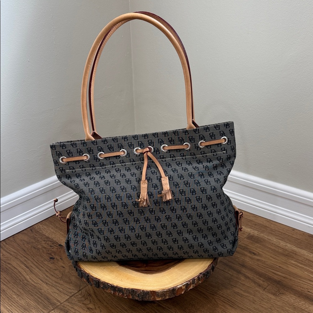 Dooney & Bourke Black and Tan Monogram Tassel Tote
